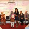 Dr Vanessa Li of HK EDB presenting  Hon Mention Certificate