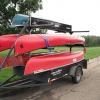 5 canoes on trailer to be tied down