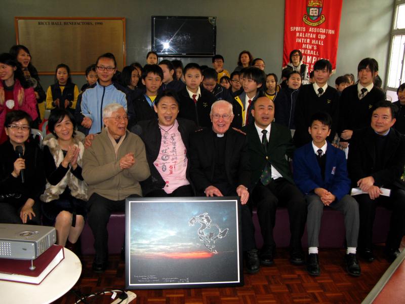 02 Presenting birthday gift to Fr Deignan