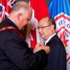 Peter Wong awarded medal by Markham Mayor F. Scarpitti