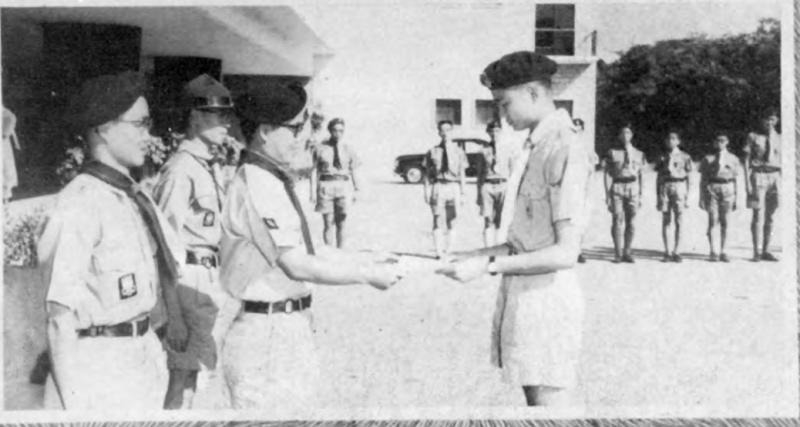 63Scouting_Mr. George Law presenting certificate to Felix Ko