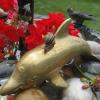 snail on copper dolphin