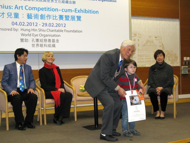 11 Mr Laurence Tam presenting prize to winner